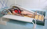 Вертикальное подводное вытяжение позвоночника