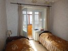 Двухместный номер с 2 отдельными кроватями и общей ванной комнатой